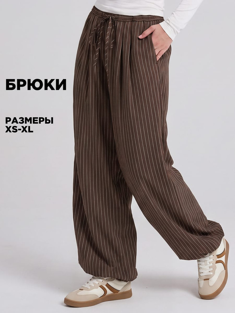 Брюки алладины деловые в полоску - Женщинам - фото 2