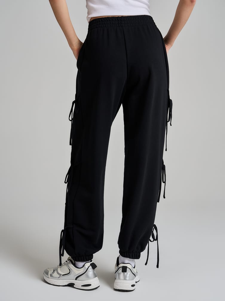 Брюки джоггеры с завязками по бокам