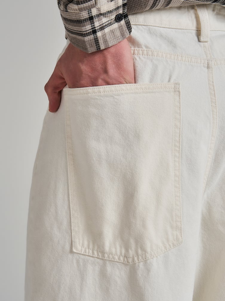 Широкие джинсы трубы с вареным эффектом