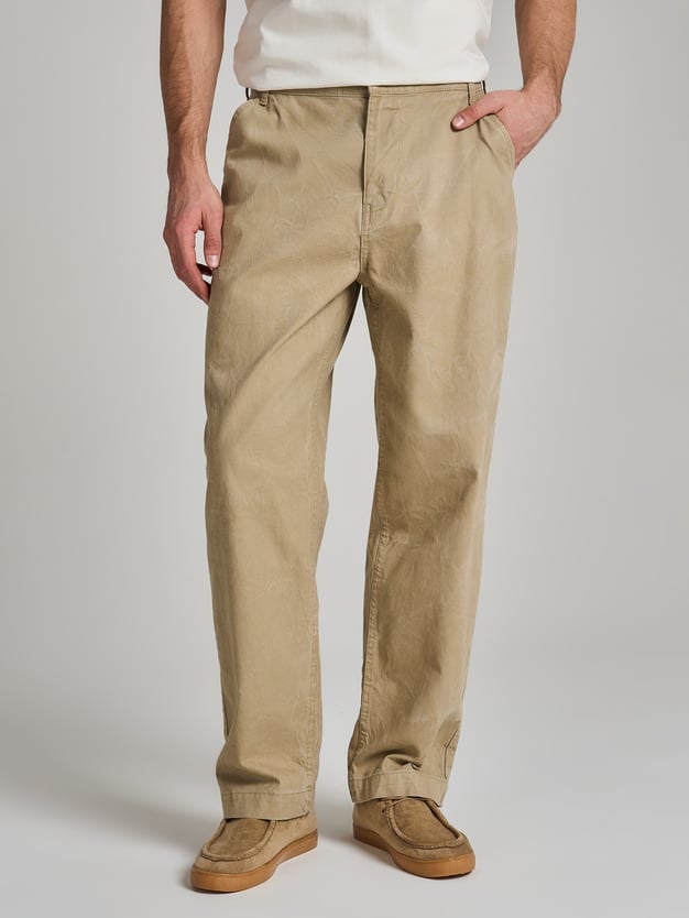 Зауженные брюки с вареным эффектом