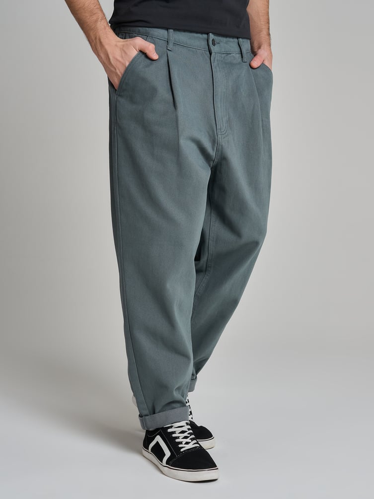 Зауженные широкие брюки