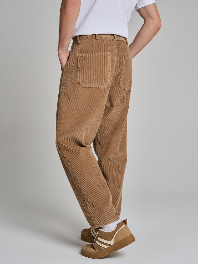 Вельветовые зауженные брюки