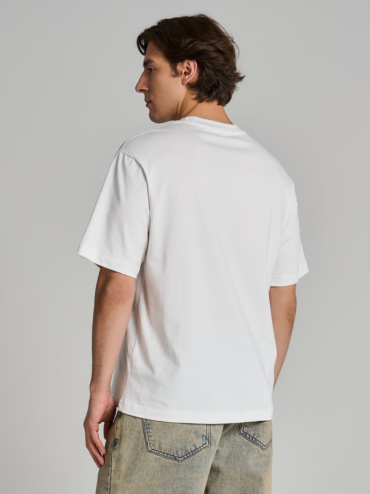 Футболка с надписью в стиле дрейн