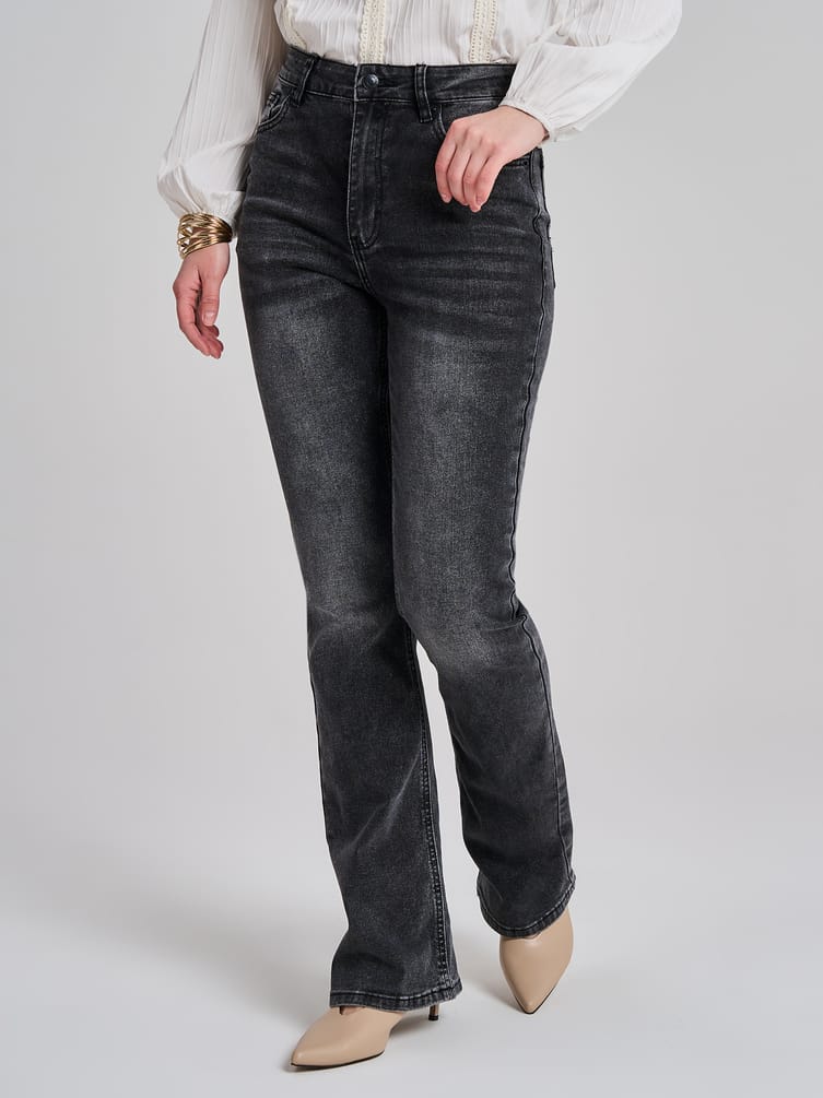 Джинсы клеш от колена