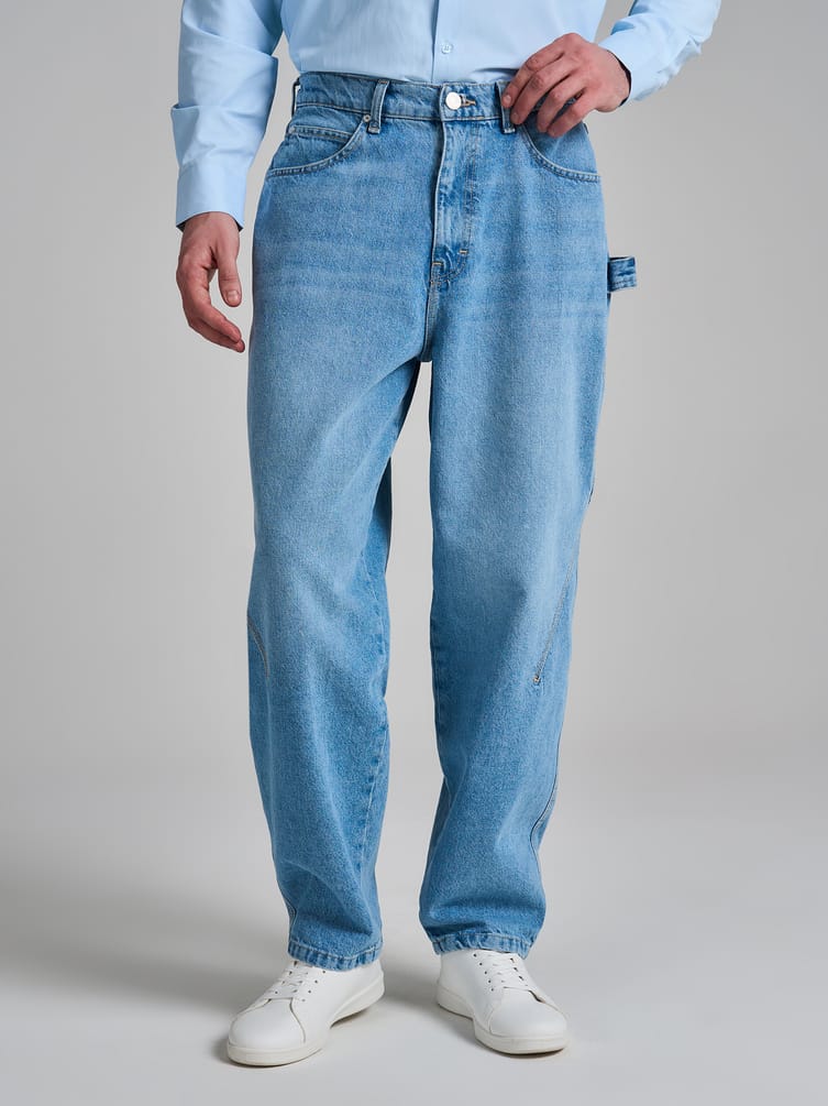 Джинсы багги зауженные с декоративной петлей