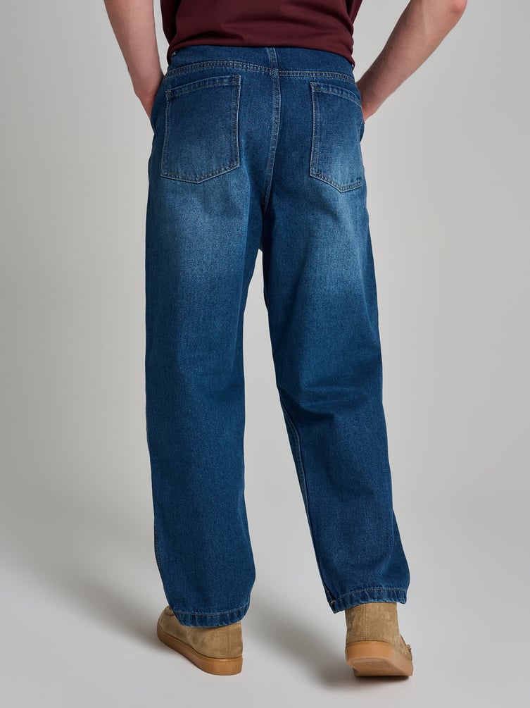 Зауженные джинсы бананы