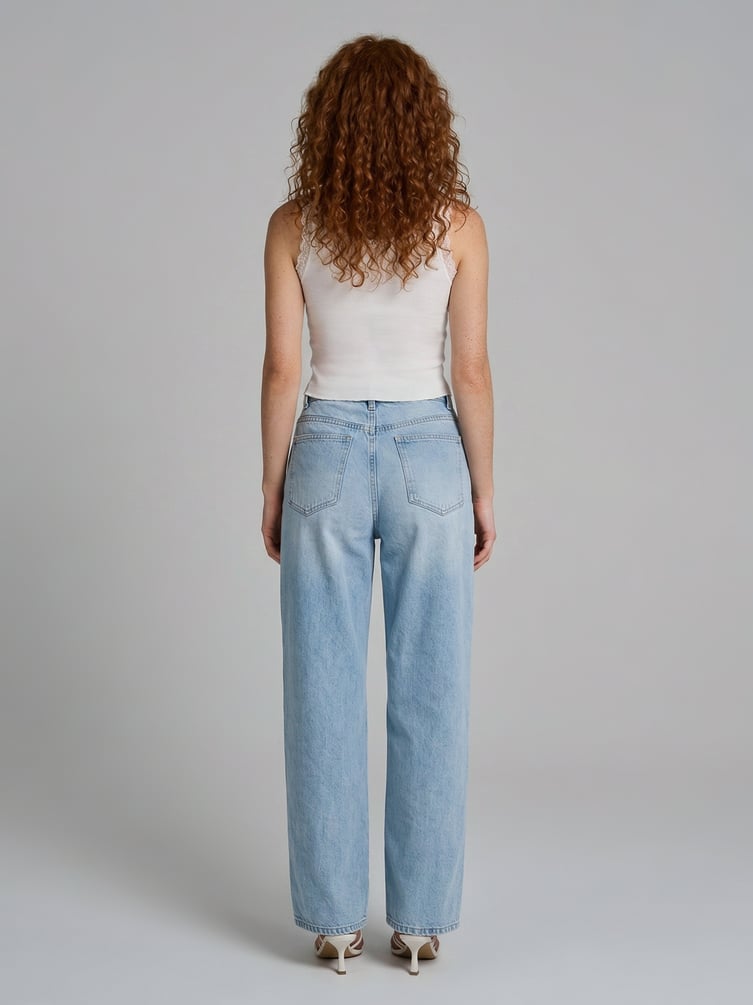 Джинсы широкие с асимметричной застежкой