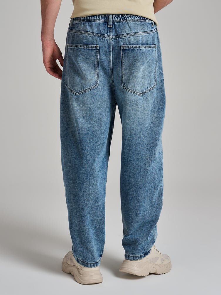 Джинсы багги с вареным эффектом