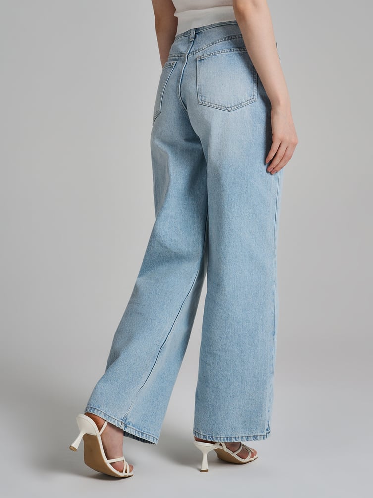 Джинсы широкие с асимметричной застежкой