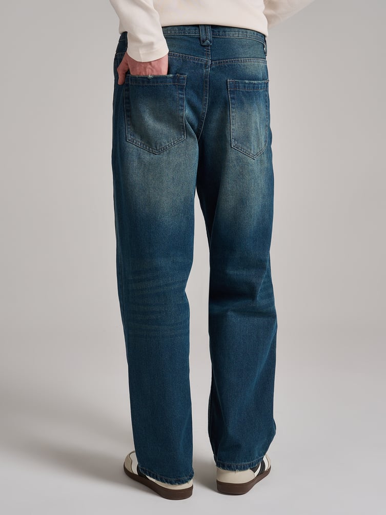 Джинсы багги с декоративным смещенным швом