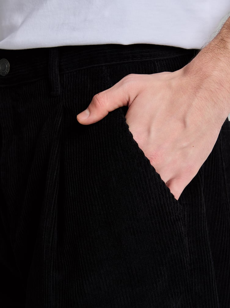 Вельветовые зауженные брюки