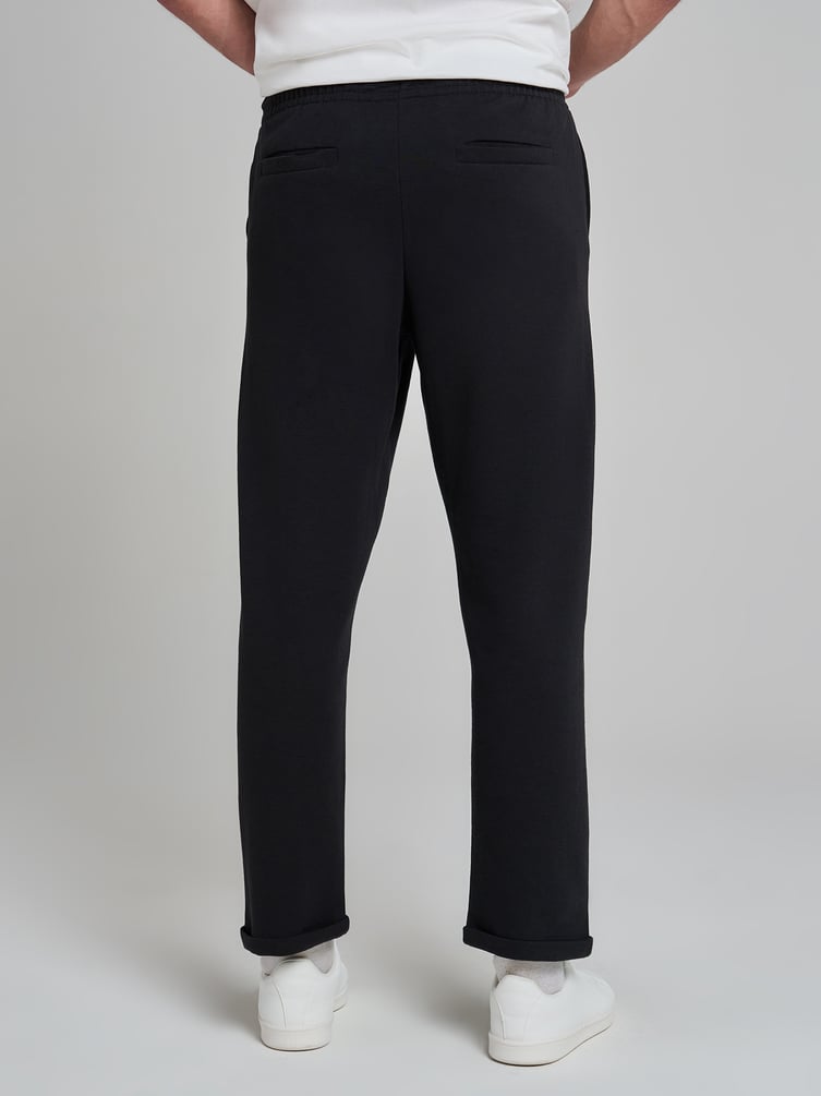 Брюки зауженные на резинке