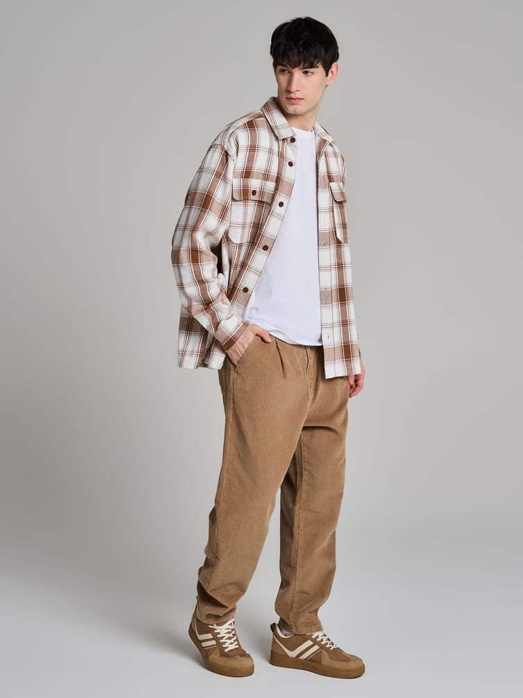 Вельветовые зауженные брюки