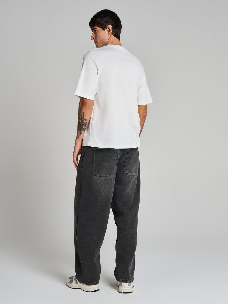 Широкие джинсы багги с вареным эффектом