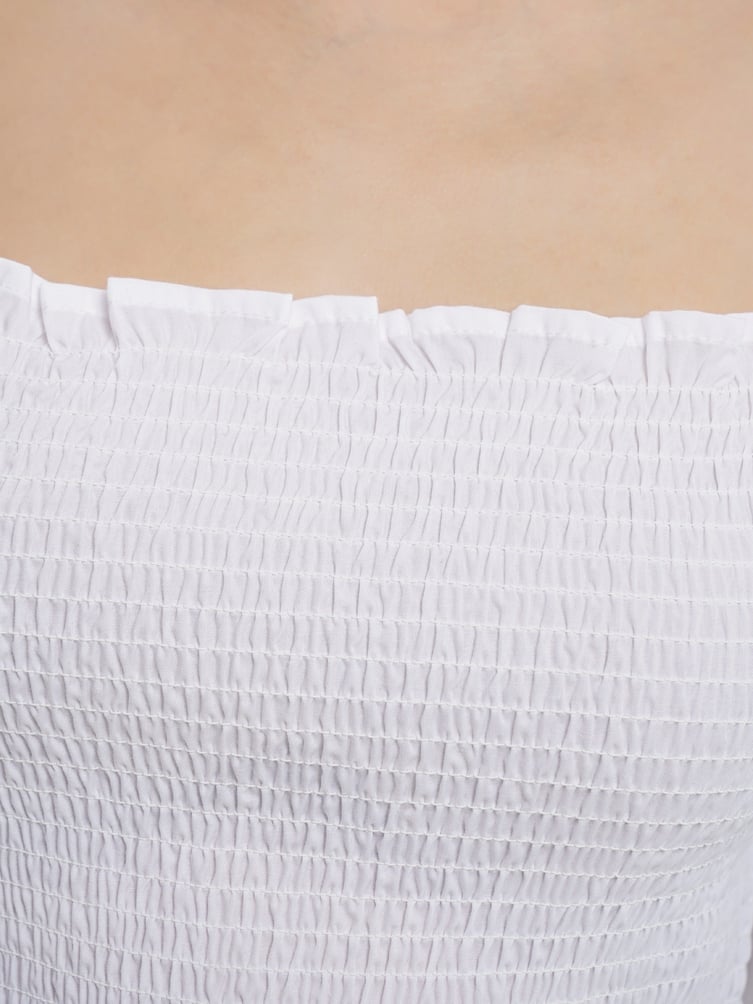 Укороченная блузка с объемными рукавами