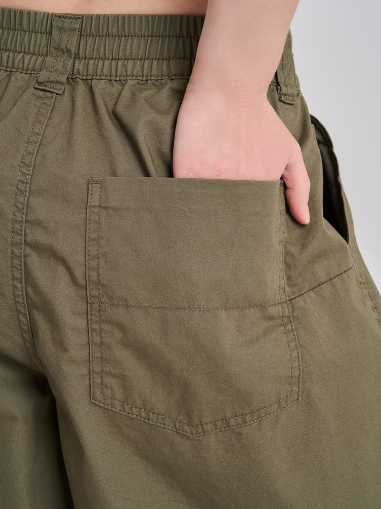 Брюки-бананы с защипами