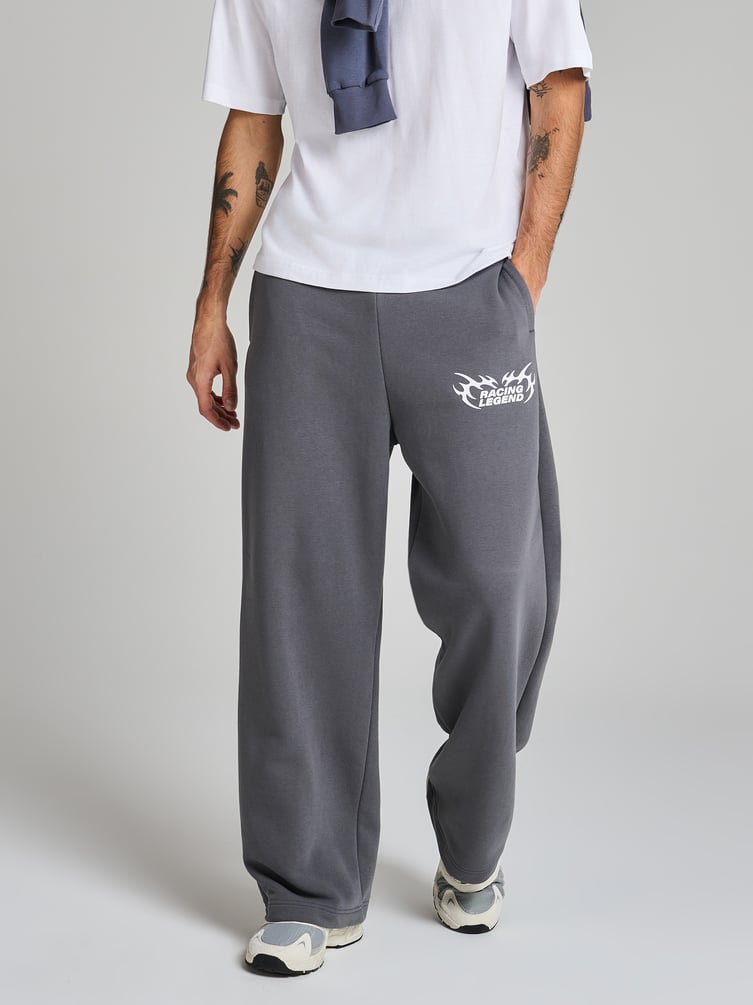 Теплые брюки оверсайз с надписью и начесом