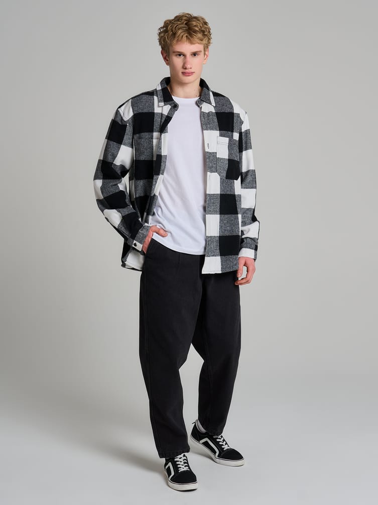 Зауженные джинсы бананы