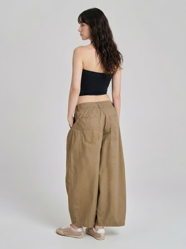 Брюки-бананы с защипами