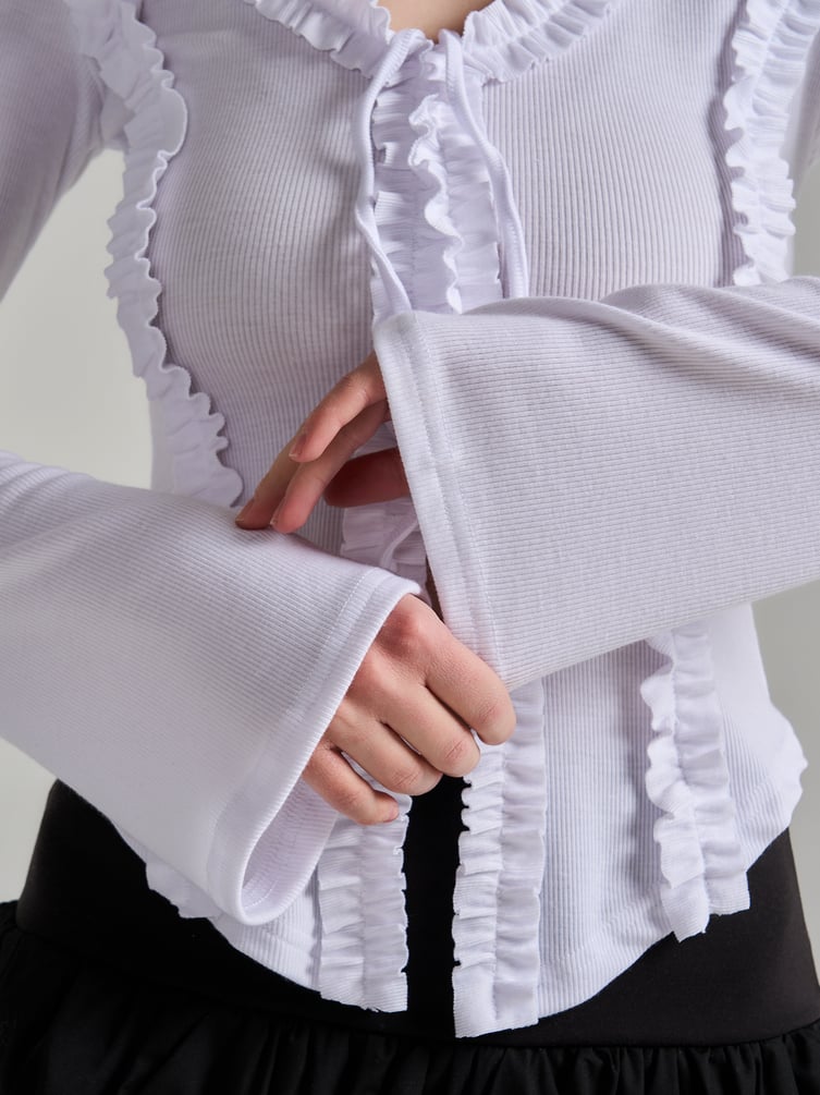 Блузка нарядная с рюшами