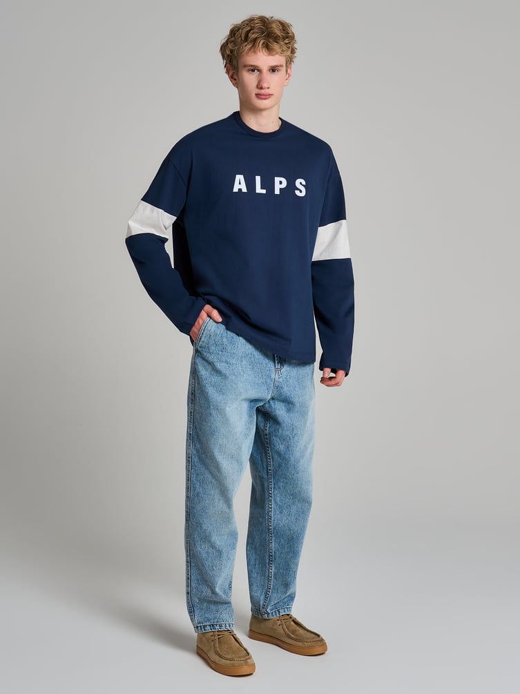 Зауженные джинсы бананы