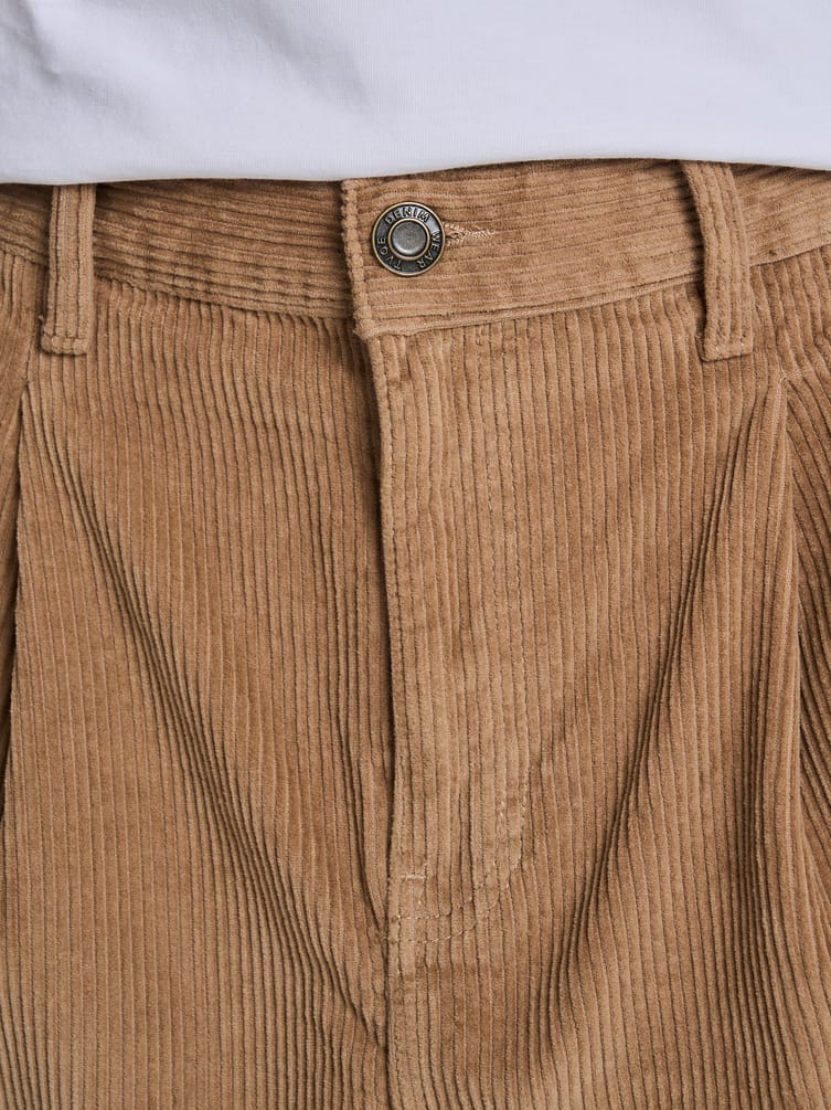 Вельветовые зауженные брюки