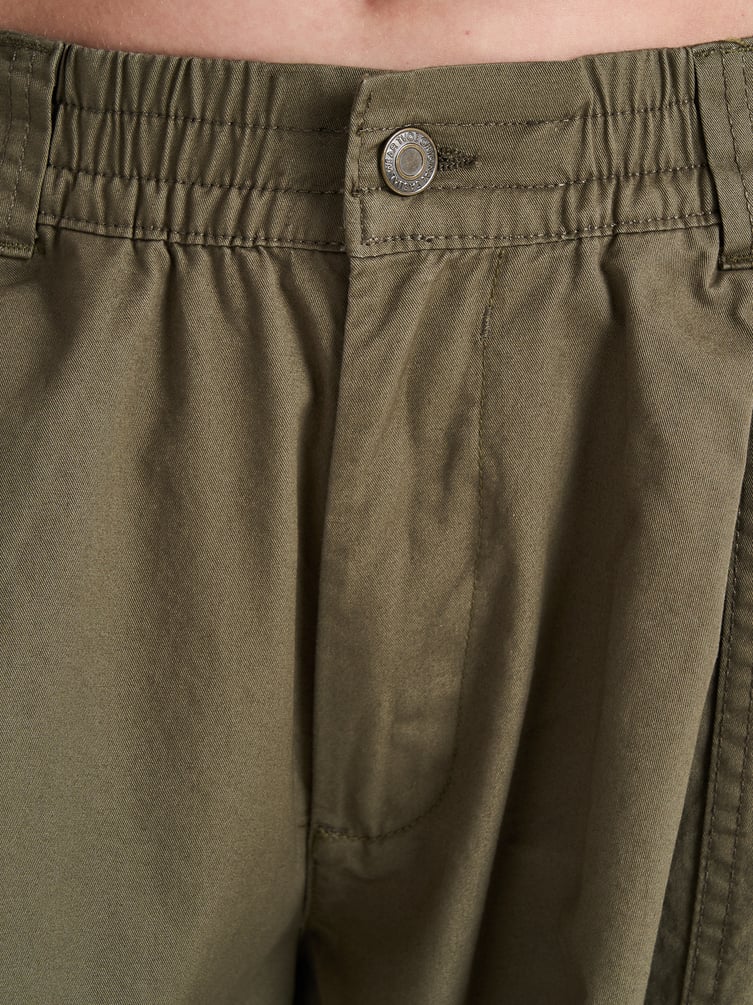 Брюки-бананы с защипами