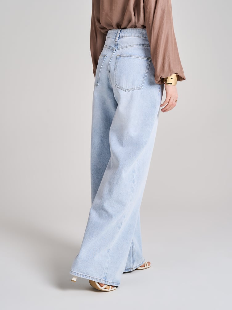 Джинсы широкие