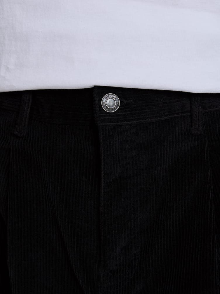 Вельветовые зауженные брюки