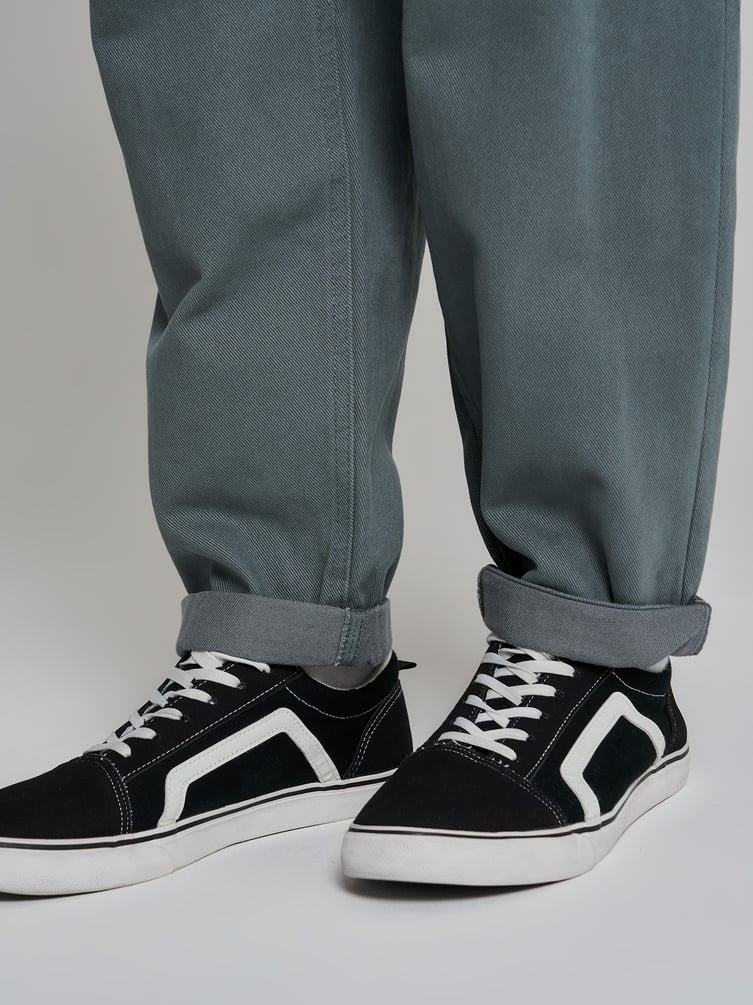 Зауженные широкие брюки