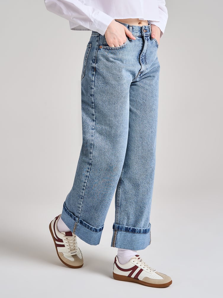 Джинсы широкие с подворотами