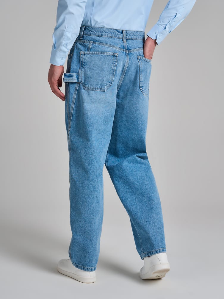 Джинсы багги зауженные с декоративной петлей