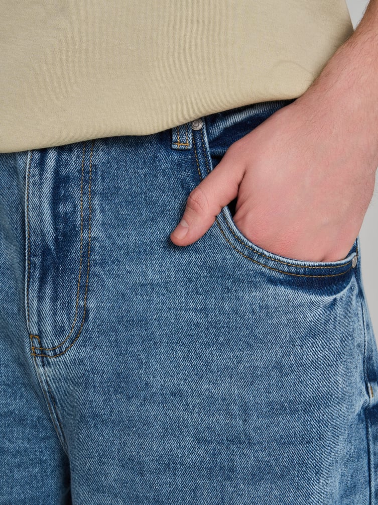 Джинсы багги с вареным эффектом