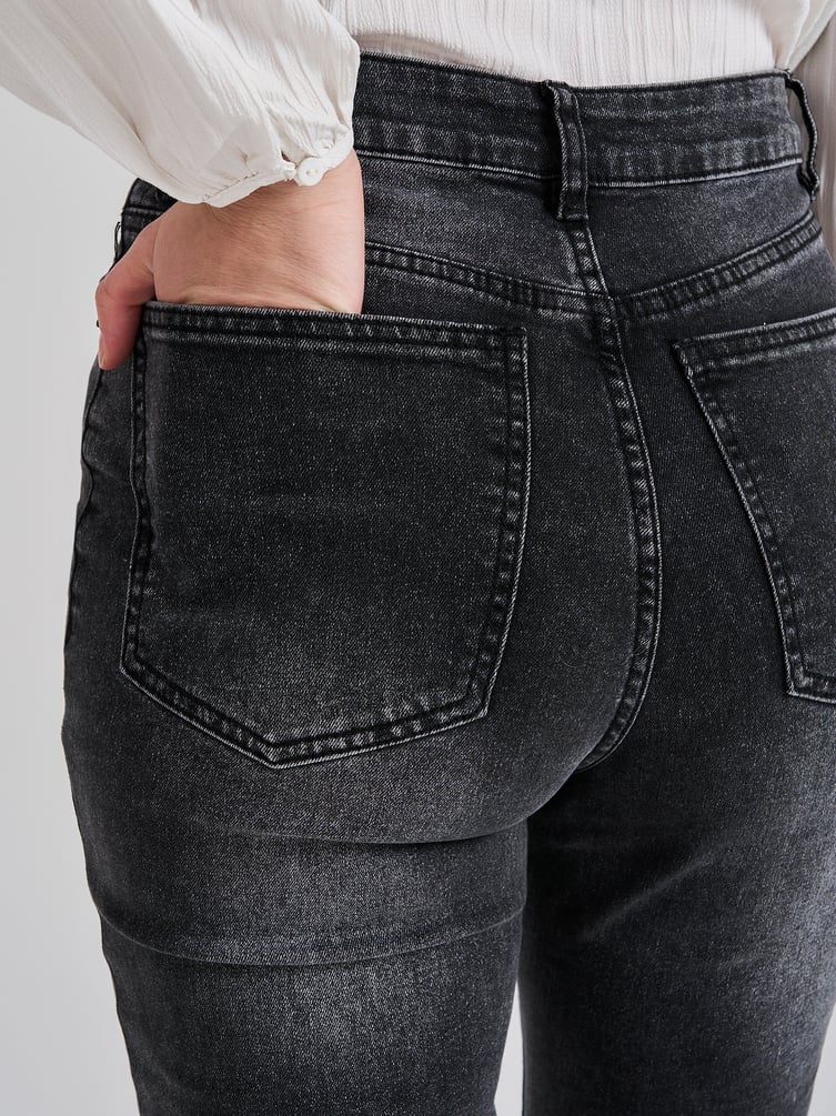 Джинсы клеш от колена