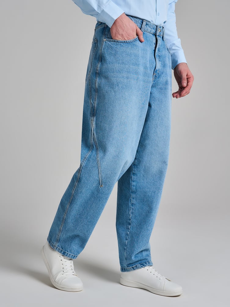 Джинсы багги зауженные с декоративной петлей