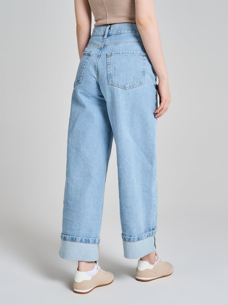 Джинсы широкие с подворотами