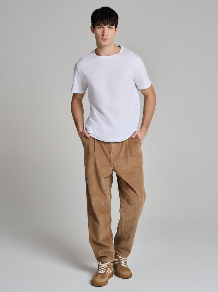 Вельветовые зауженные брюки