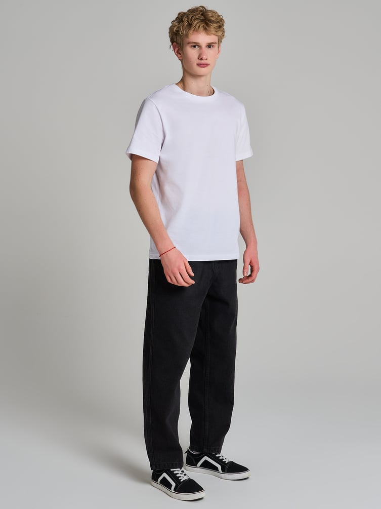 Зауженные джинсы бананы