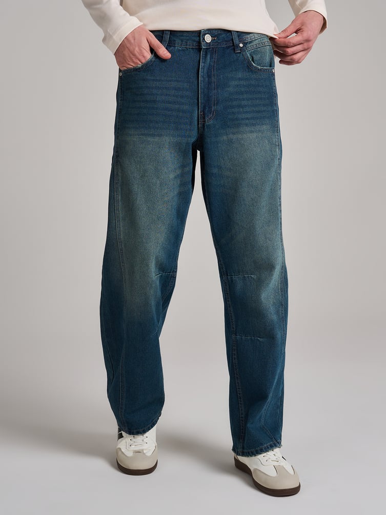 Джинсы багги с декоративным смещенным швом