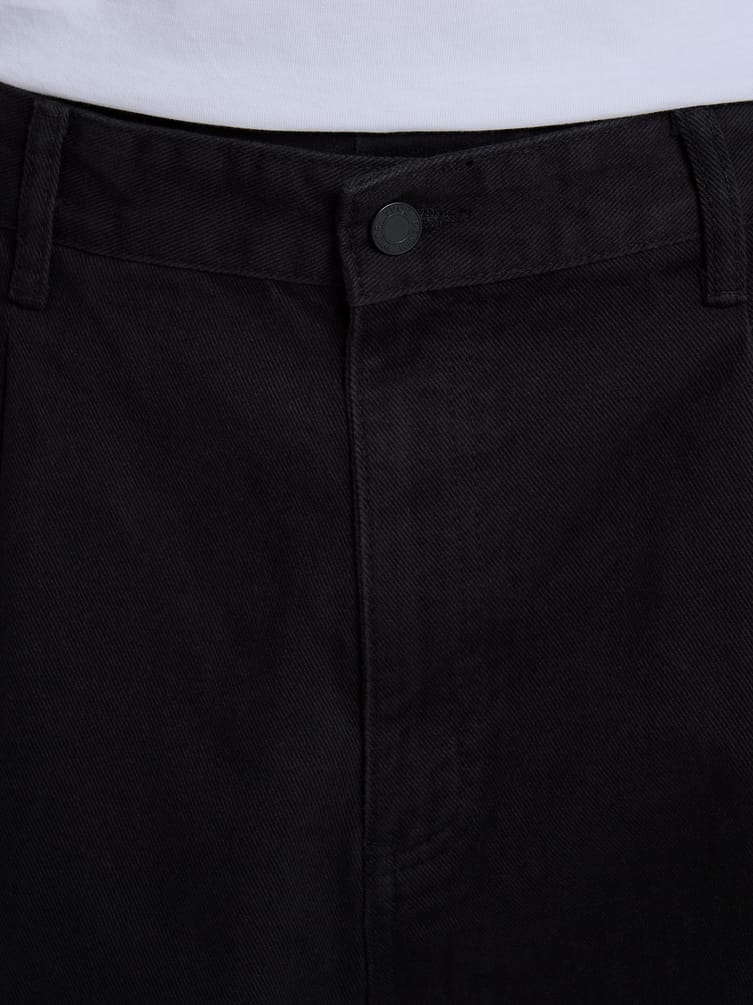 Зауженные широкие брюки