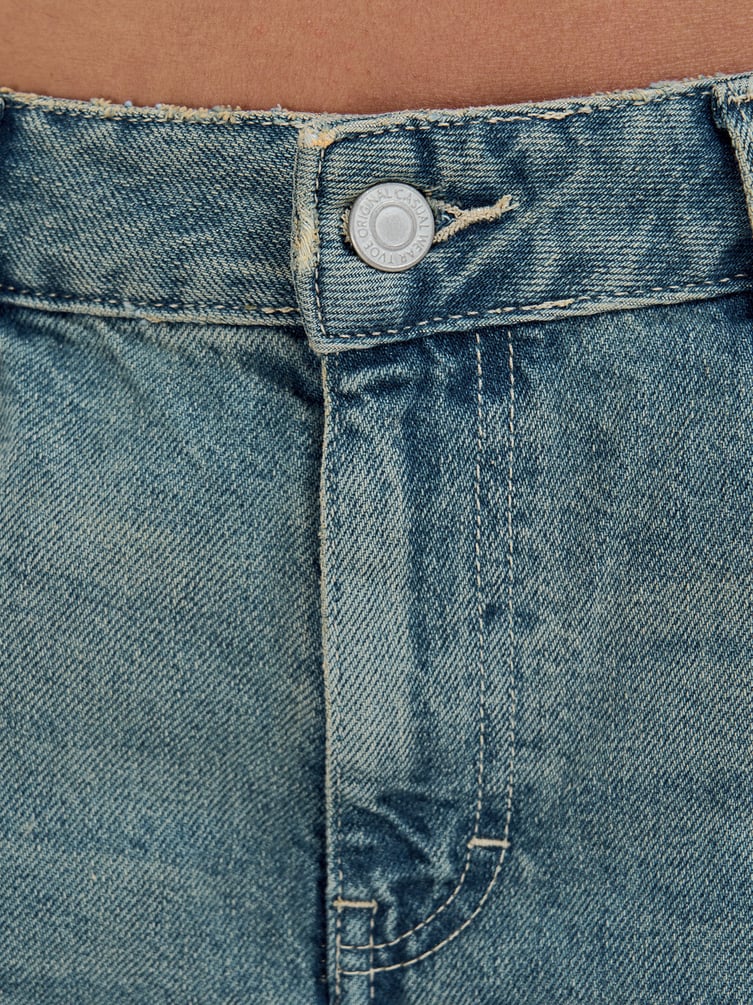 Джинсы багги с вареным эффектом