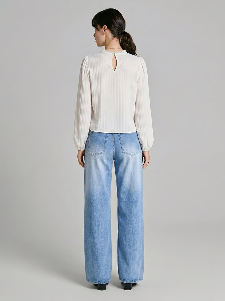 Джинсы широкие