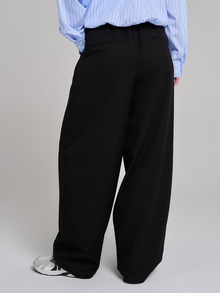 Брюки бананы классические