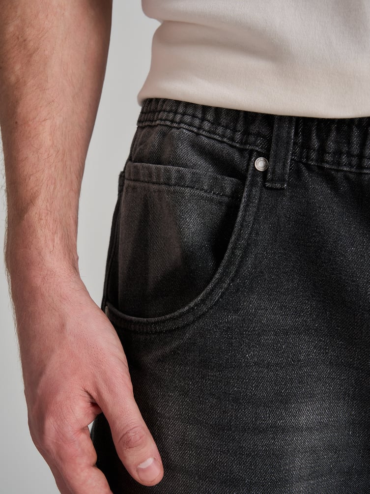 Джинсы багги с вареным эффектом