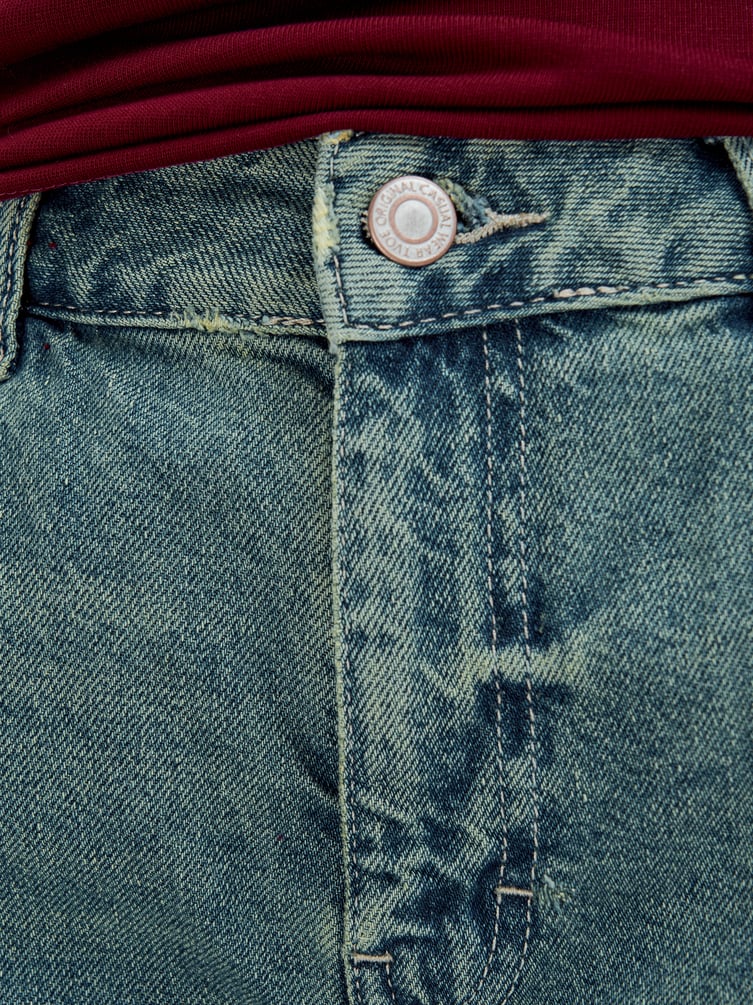 Джинсы багги с вареным эффектом