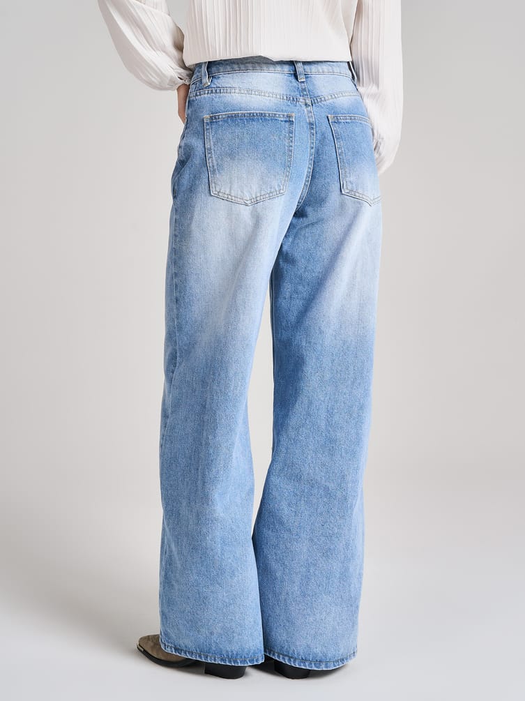 Джинсы широкие