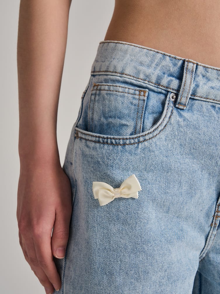 Джинсы широкие багги с бантиками