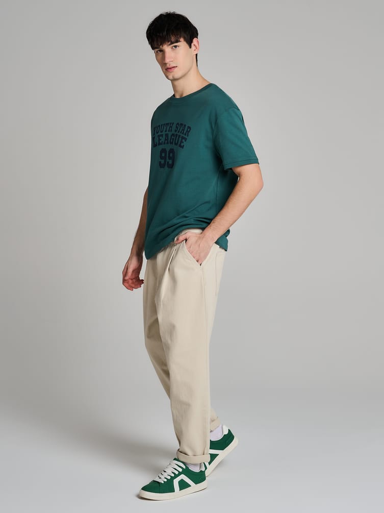 Зауженные широкие брюки