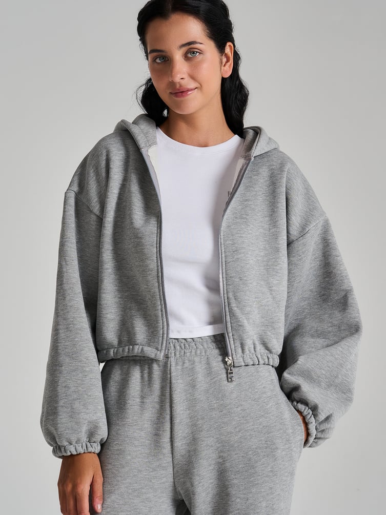 Укороченная зипка оверсайз на молнии с капюшоном и начесом