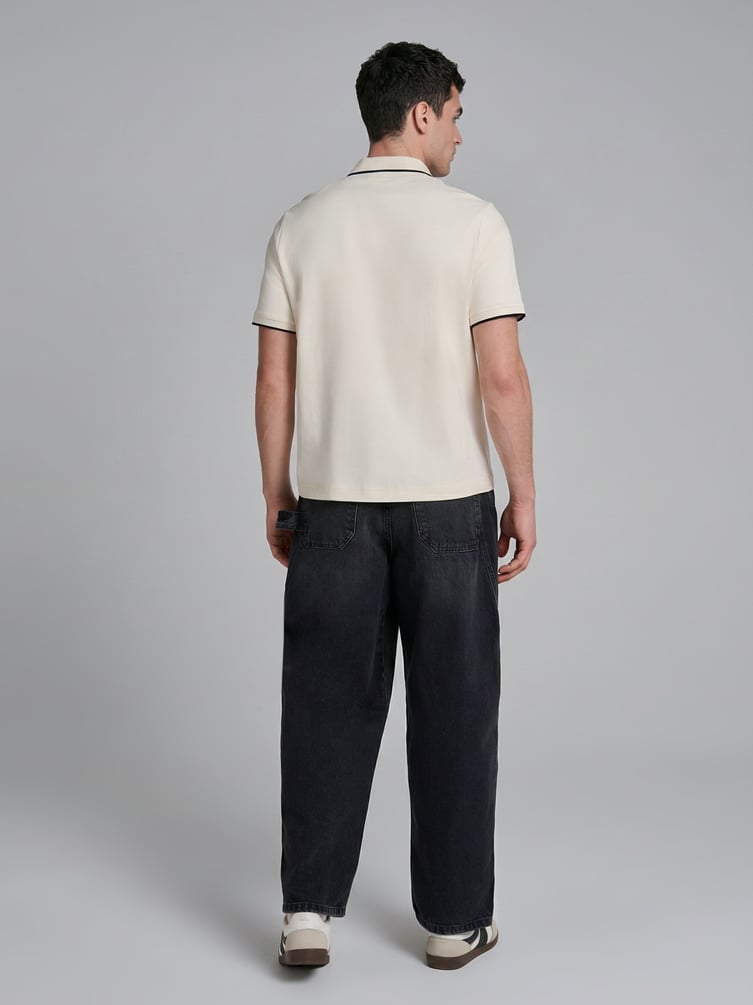 Джинсы багги зауженные с декоративной петлей